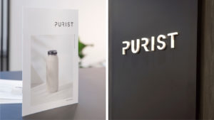 Purist brochure and signage on trade show booth